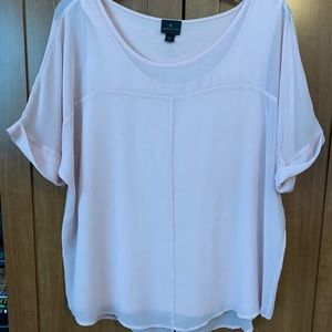 Soft pink short sleeve blouse.
